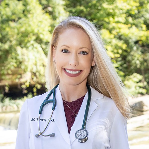 Dr Travis smiling
